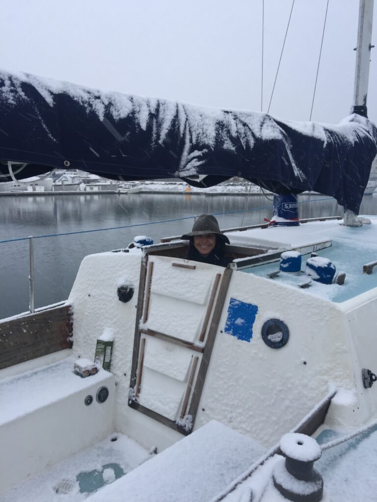 woman-sailboat-snow