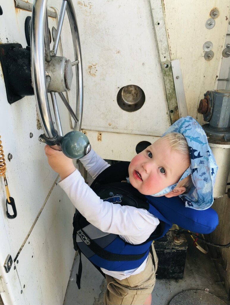 Becca Bissett POCF Mama, fisherman, and toddler